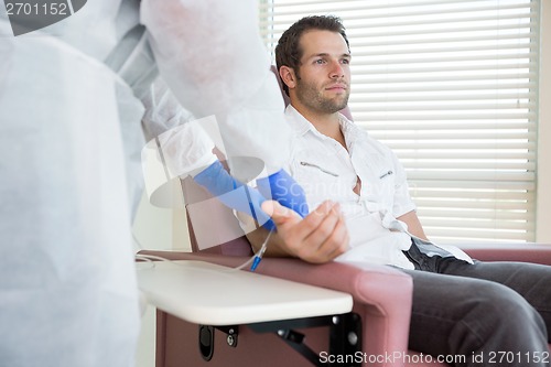 Image of Patient Receiving Intravenous Treatment In Chemo Room