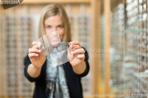 Image of Woman Showing New Reading Glasses