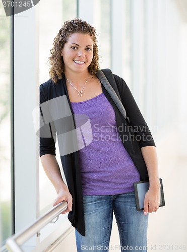 Image of Happy Female Student With Digital Tablet And Backpack