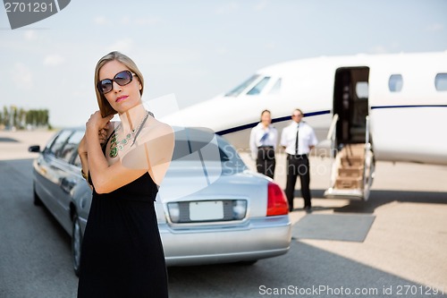 Image of Elegant Woman Making Hair At Terminal