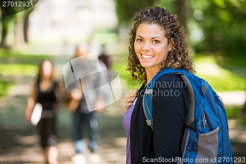 Image of Portrait Of Happy Female Grad Student