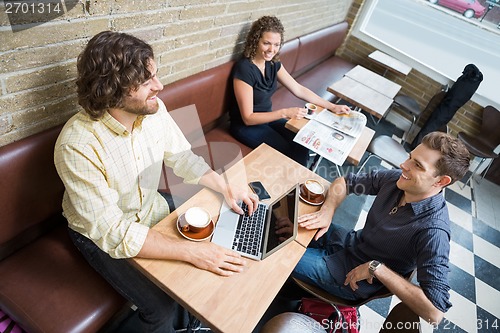 Image of Customers Spending Leisure Time In Cafeteria