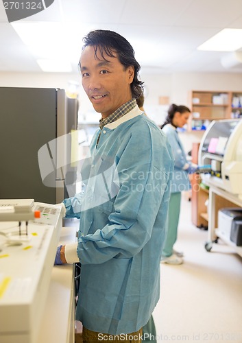 Image of Scientist Working In Laboratory