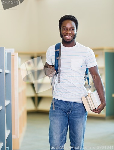 Image of Student With Backpack And Books In Library