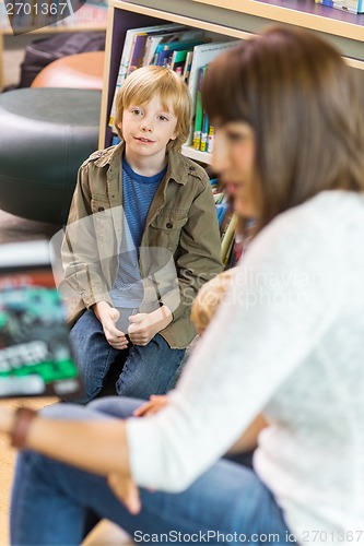 Image of Boy With Teacher In Library