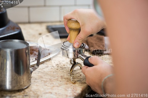 Image of Barista Tamping Espresso