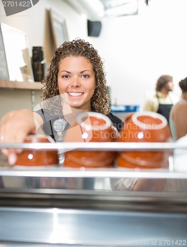 Image of Waitress Working In Cafeteria