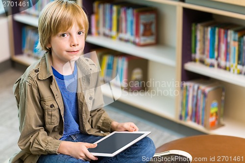 Image of Boy With Digital Tablet In Library