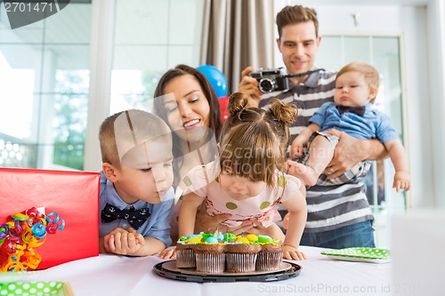 Image of Family And Children Celebrating Birthday At Home