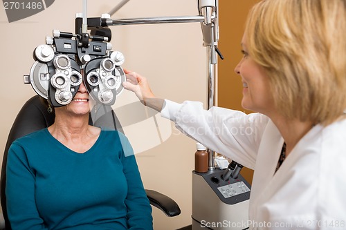 Image of Optician Examining Patient's Vision