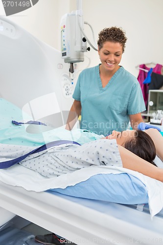 Image of Nurse Preparing Patient For CT Scan