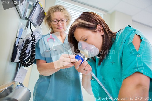 Image of Woman in Active Labor Receiving Nitrous Oxide