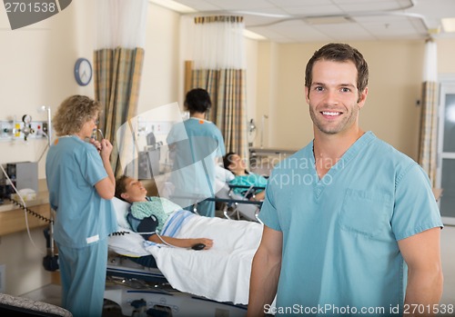 Image of Nurse With Colleagues in Hospital PACU