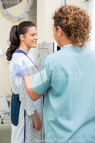 Image of Patient Looking At Nurse Before Getting Chest Xray