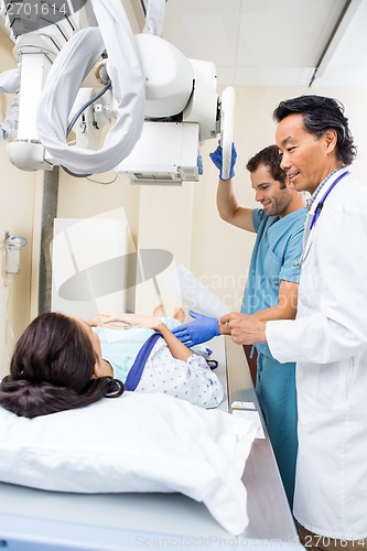 Image of Medical Team Preparing Patient For Xray