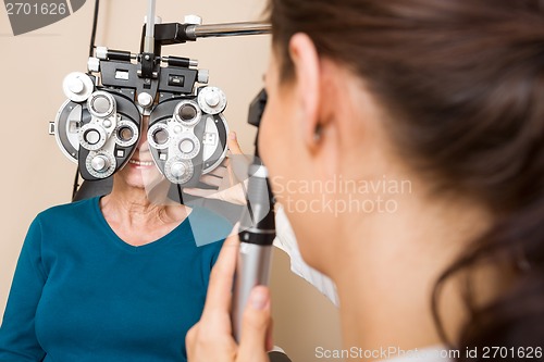 Image of Optometrist Examining Patient's Vision