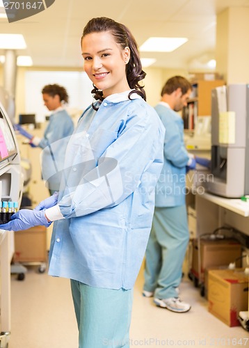 Image of Scientist With Testtube Holder In Laboratory