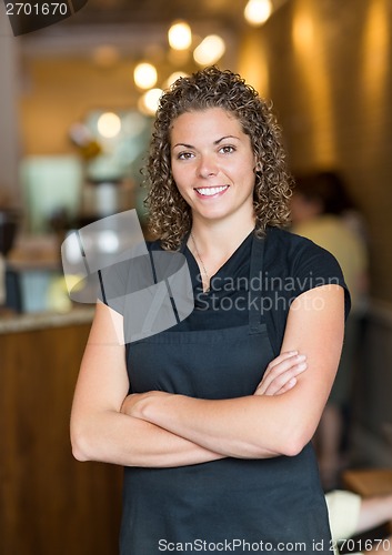 Image of Waitress Standing Arms Crossed In Espresso Bar