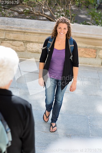Image of Confident Student With Backpack Walking On Campus