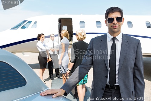 Image of Confident Businessman At Airport Terminal