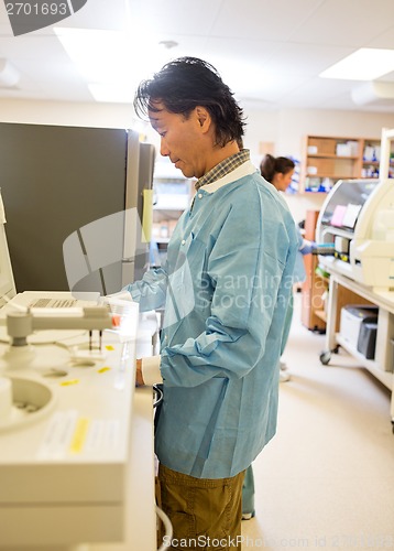 Image of Male Researcher Working In Laboratory