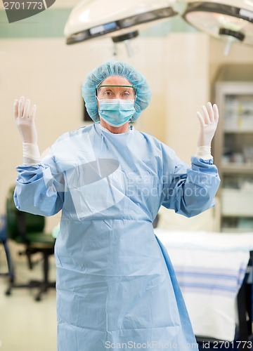 Image of Female Doctor In Surgical Gown