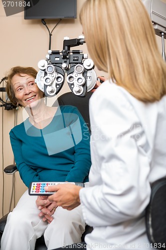 Image of Happy Senior Woman Undergoing Eye Checkup