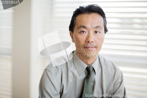 Image of Confident Cancer Specialist In Shirt And Tie