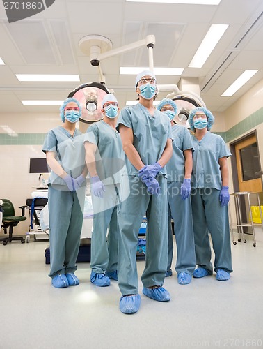 Image of Multiethnic Medical Team Standing In Operation Room