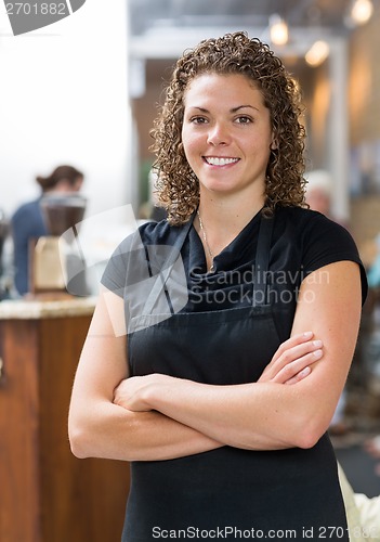 Image of Confident Waitress In Cafeteria