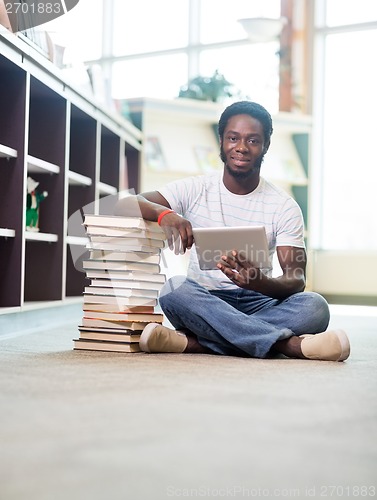 Image of Student With Digital Tablet  In Library