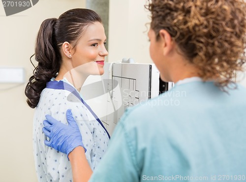 Image of Patient Looking At Nurse Before Getting Chest Xray