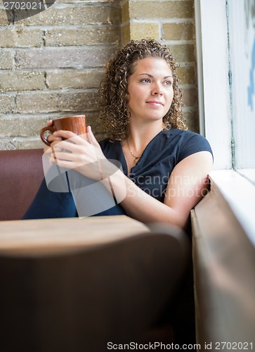 Image of Woman With Coffee Mug In Cafeteria