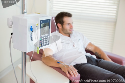 Image of IV Drip Attached To Patient's Hand During Chemotherapy