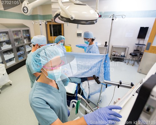 Image of Anesthesiologist in Surgical Theater