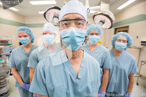 Image of Medical Team Standing In Operation Room