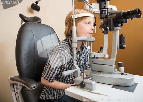 Image of Boy Undergoing Eye Examination With Slit Lamp