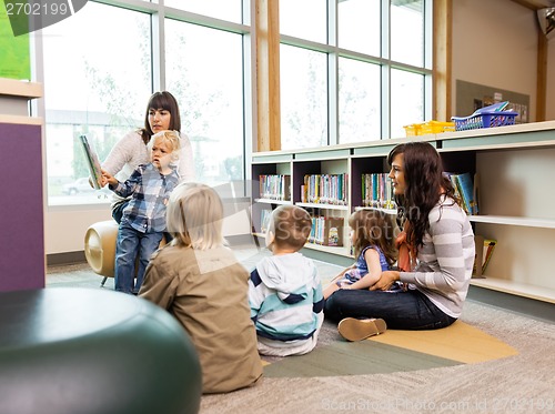 Image of Teachers And Students In Library