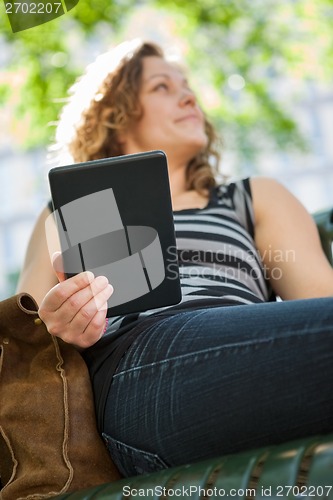 Image of University Student Holding Digital Tablet