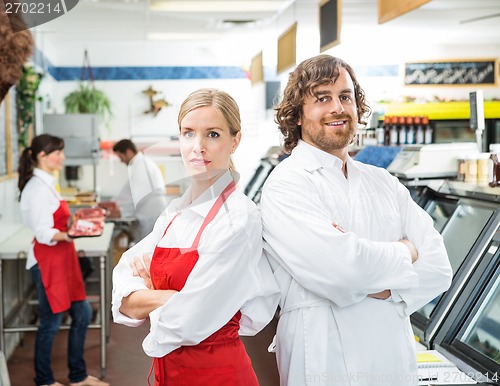 Image of Portrait Of Confident Butchers With Arms Crossed