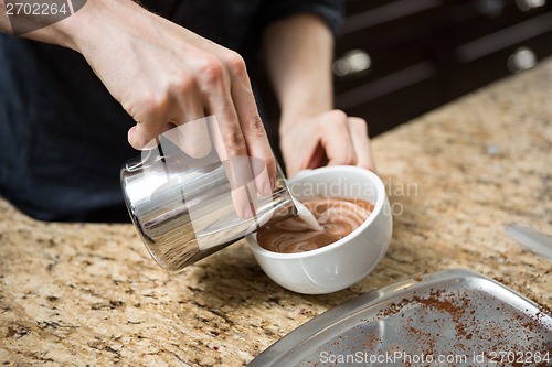 Image of Barista Making Cappuccino In Coffeeshop