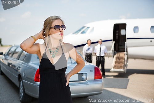 Image of Wealthy Woman In Elegant Dress At Terminal