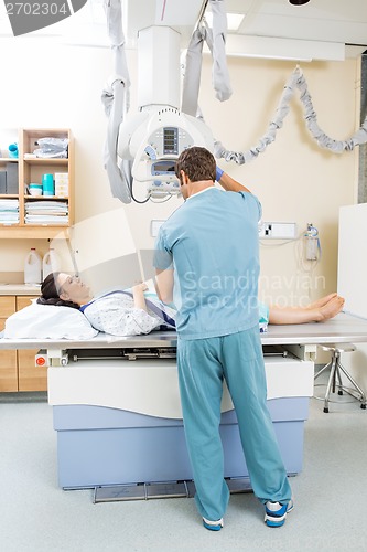 Image of Nurse Preparing Xray For Patient