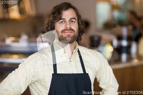 Image of Confident Owner Standing In Espresso Bar