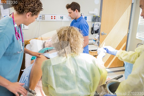 Image of Medical Team Delivering Baby