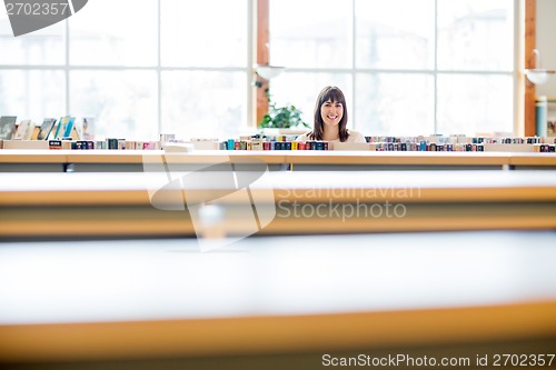 Image of Student Smiling In Bookstore