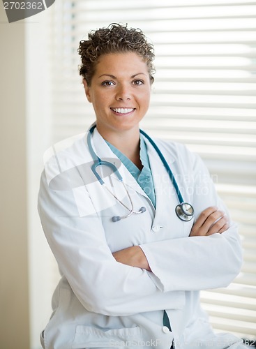 Image of Confident Cancer Specialist With Arms Crossed In Clinic