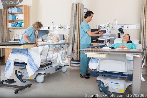 Image of Nurses Caring for Patients in PACU