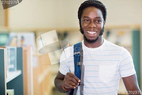 Image of Student Looking Away In Bookstore