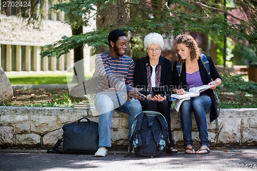 Image of University Students Using Digital Tablet